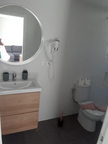 Foto de una habitación de Apartamentos Alisios Playa