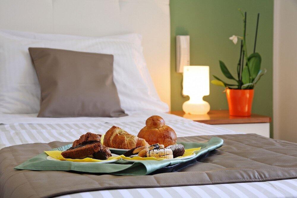 Foto de una habitación de Aparthotel Riviera Ionica