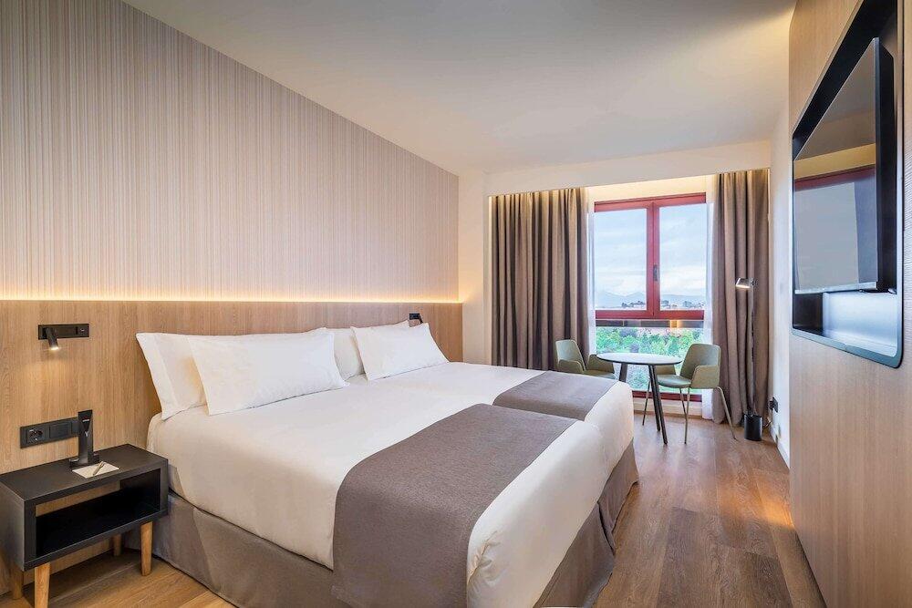 Foto de una habitación de Hotel Occidental Pamplona