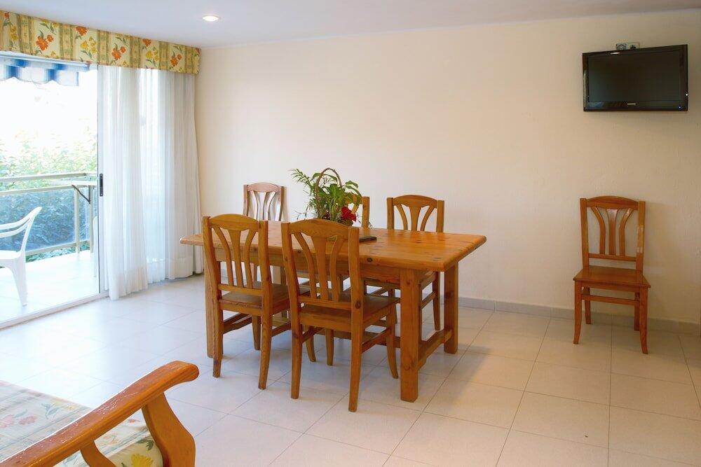 Foto de una habitación de Apartamentos Rentalmar Los Peces
