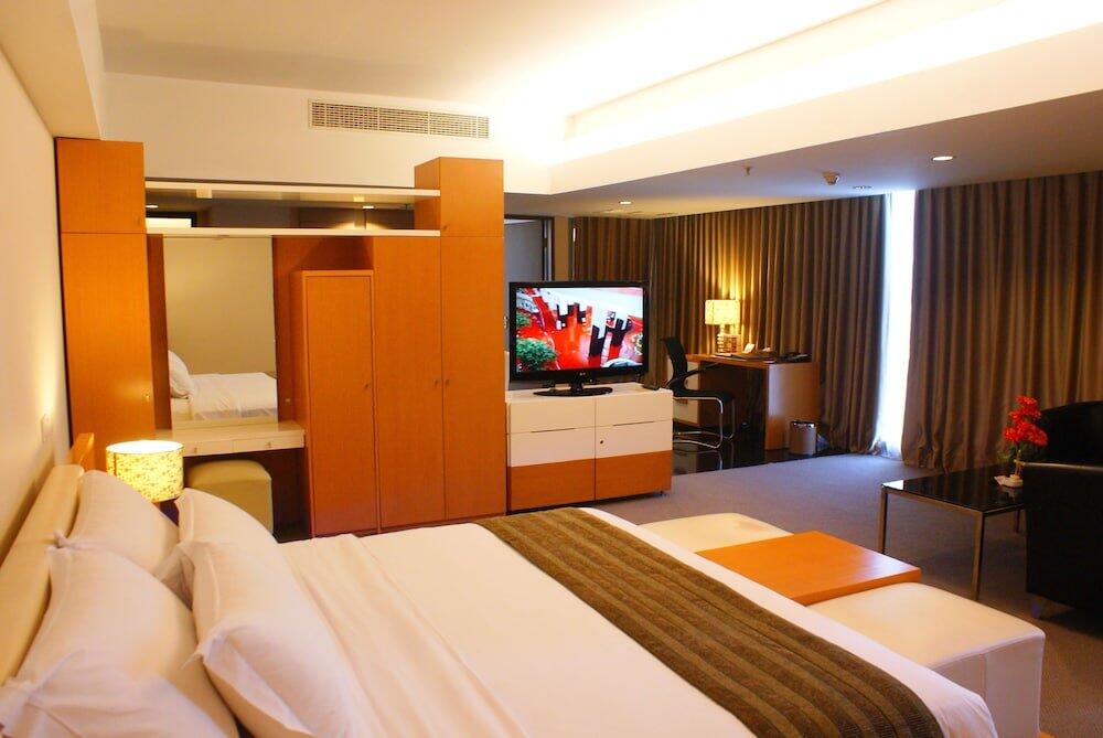 Foto de una habitación de Merlynn Park Hotel