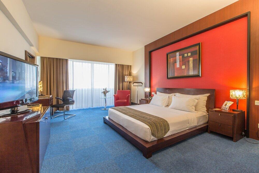 Foto de una habitación de Merlynn Park Hotel