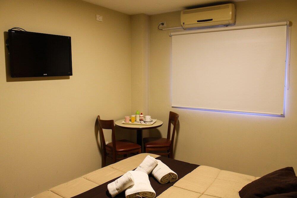 Foto de una habitación de Savannah Cordoba Hotel