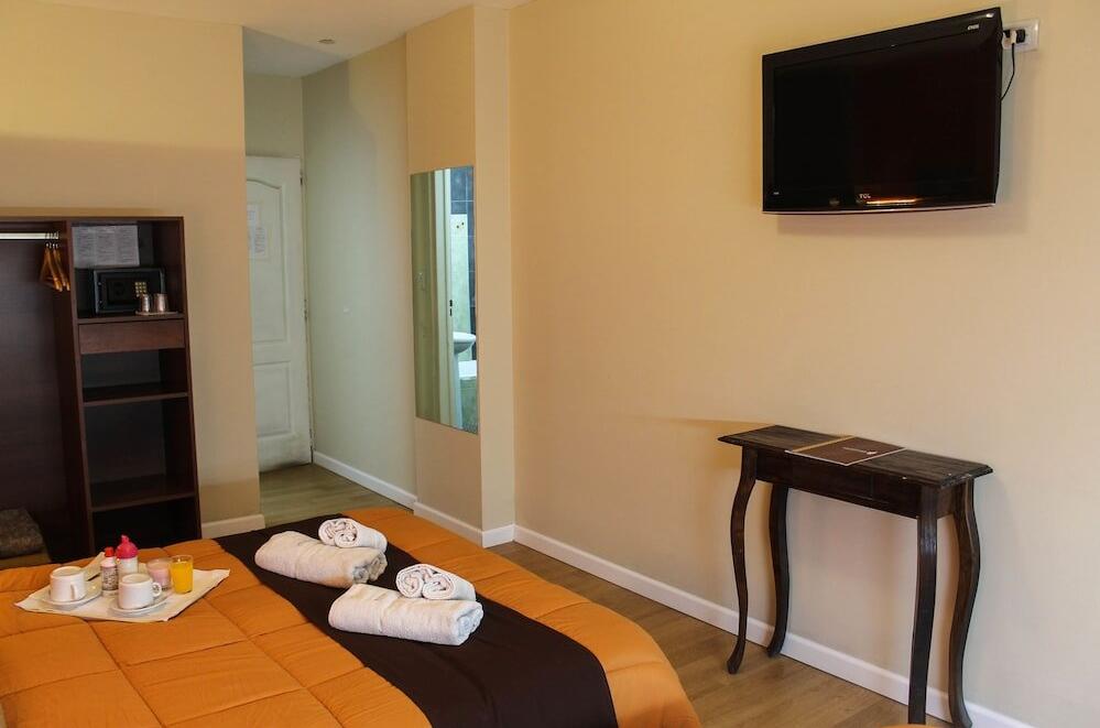 Foto de una habitación de Savannah Cordoba Hotel
