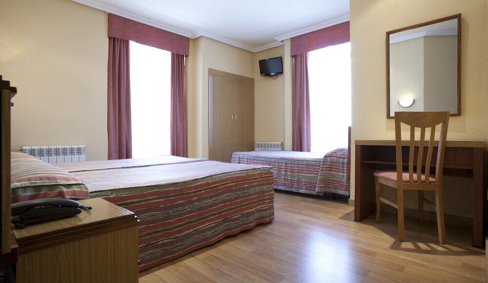 Foto de una habitación de Hotel Mediodia