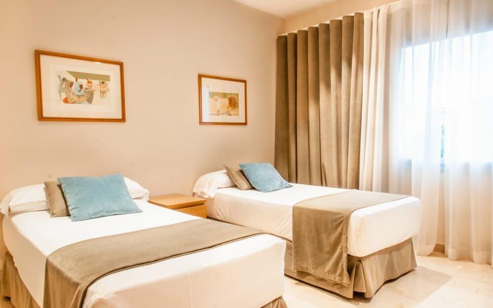 Foto de una habitación de Hotel Costabella