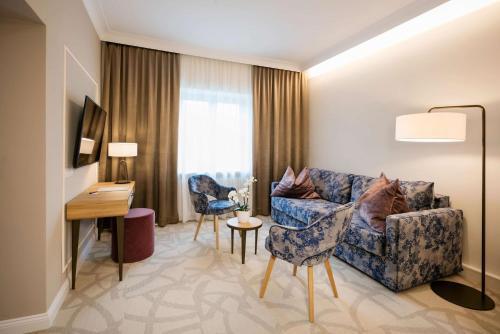 Foto de una habitación de Hotel ARCOTEL Castellani Salzburg