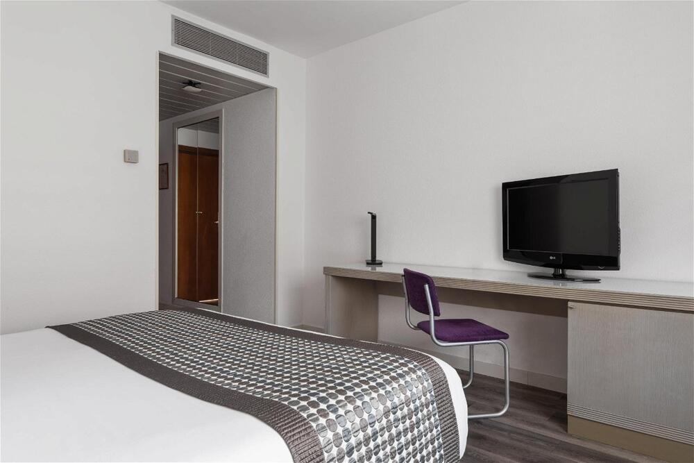 Foto de una habitación de Hotel Exe Salamanca