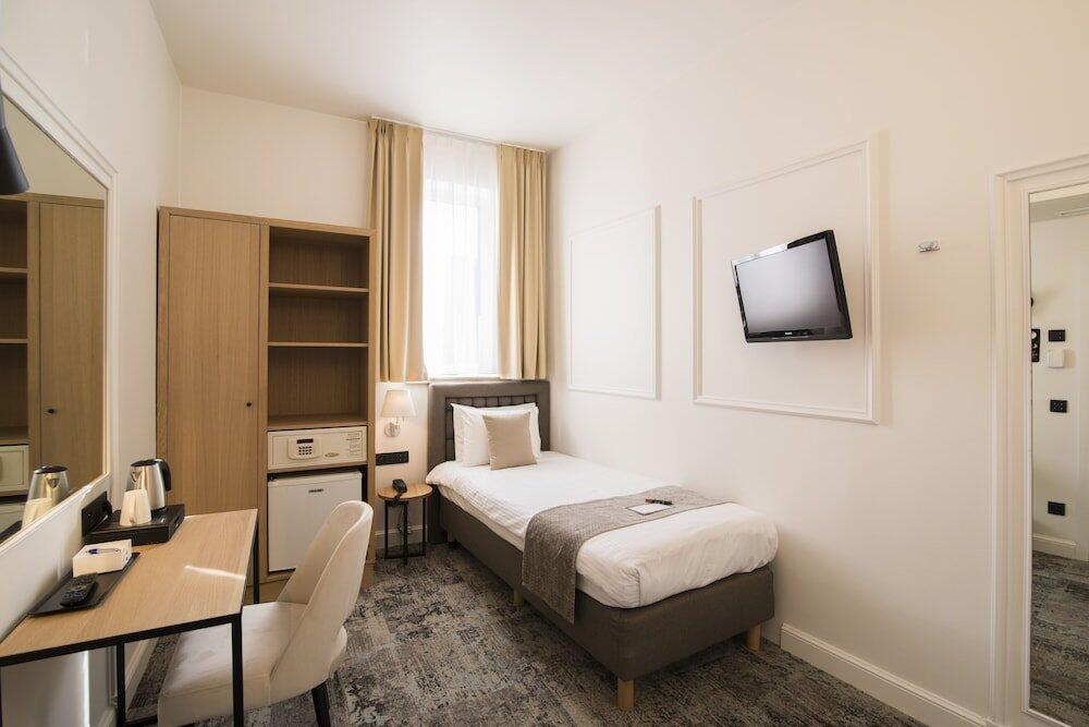 Foto de una habitación de Hotel Academie