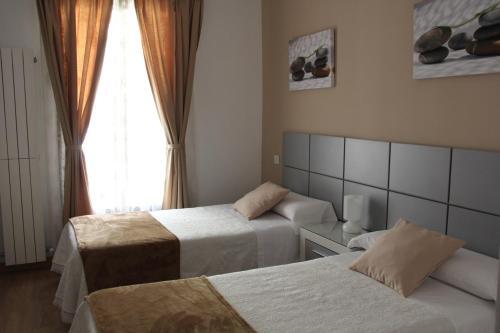 Foto de una habitación de Casa de Huéspedes Galaica