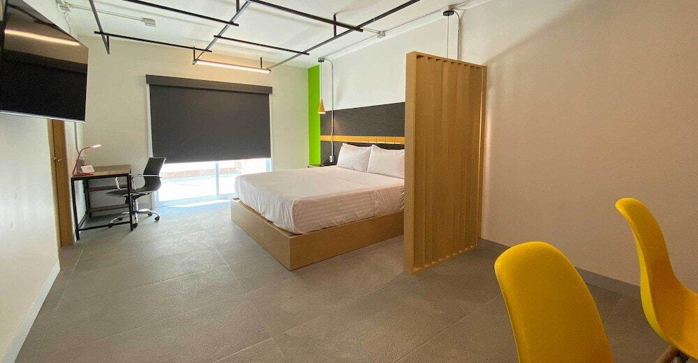 Foto de una habitación de Hotel The Host Business Suites at WTC