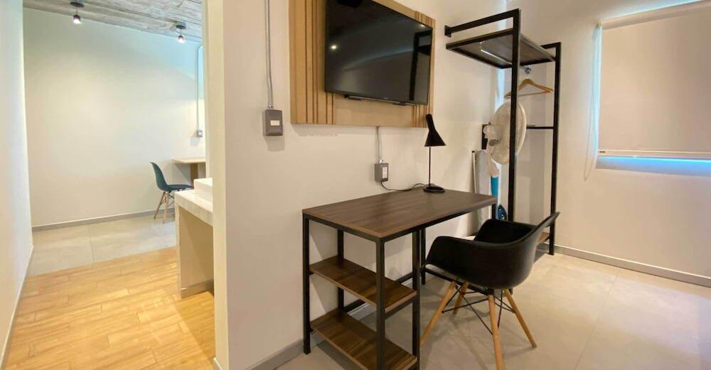 Foto de una habitación de Hotel The Host Business Suites at WTC
