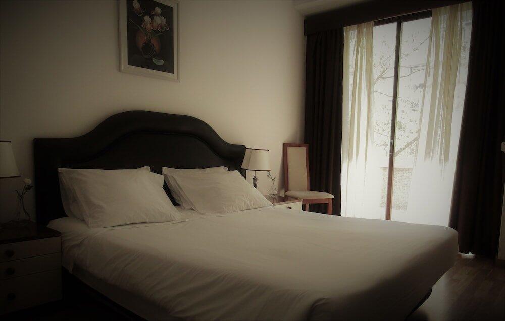 Foto de una habitación de Hotel Excelsior