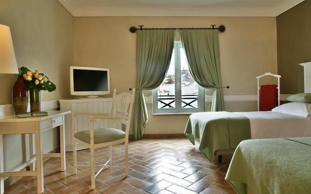 Foto de una habitación de Hotel M&amp;#039;AR De AR Muralhas