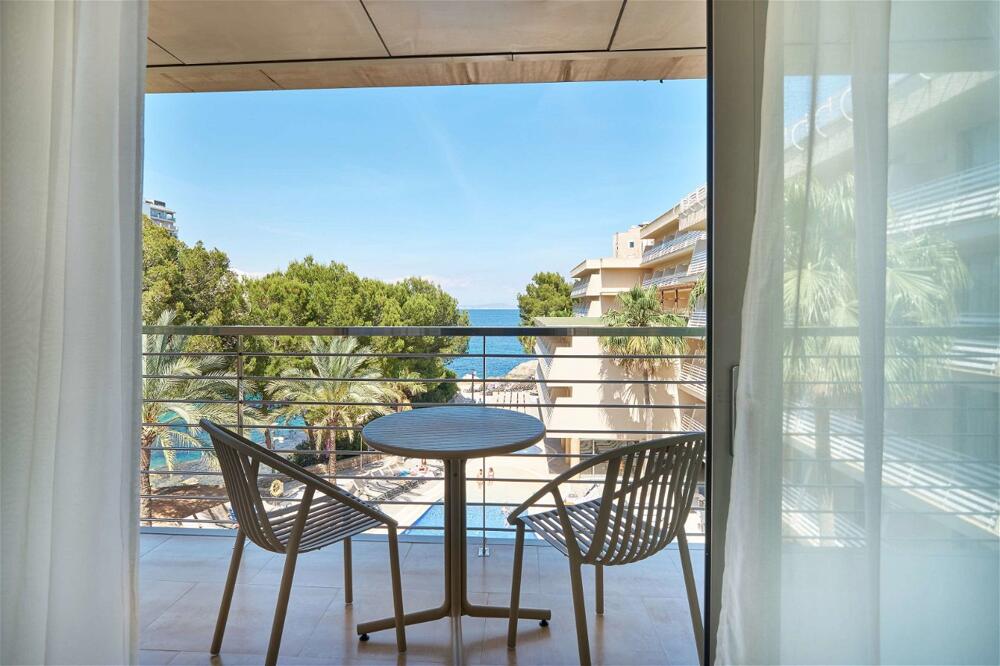 Foto de una habitación de Hotel Occidental Cala Viñas