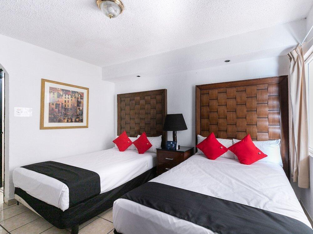 Foto de una habitación de Hotel Capital O Zona Dorada Inn, Mazatlán