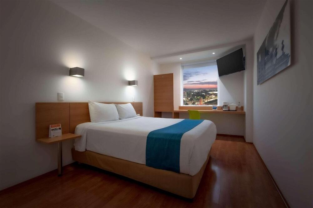 Foto de una habitación de Hotel Sleep Inn Leon Antares
