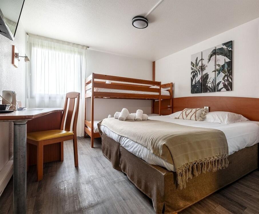 Foto de una habitación de Hotel Les Dépendances Du Cyrano
