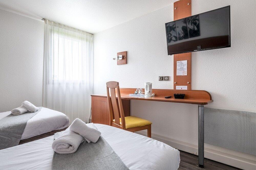 Foto de una habitación de Hotel Les Dépendances Du Cyrano