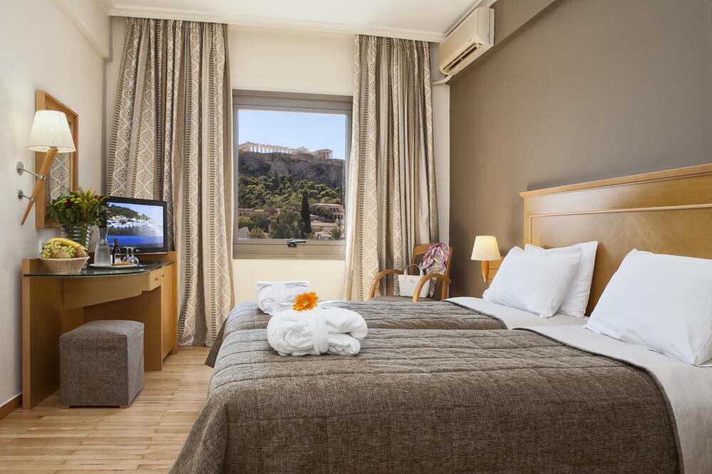 Foto de una habitación de Plaka Hotel