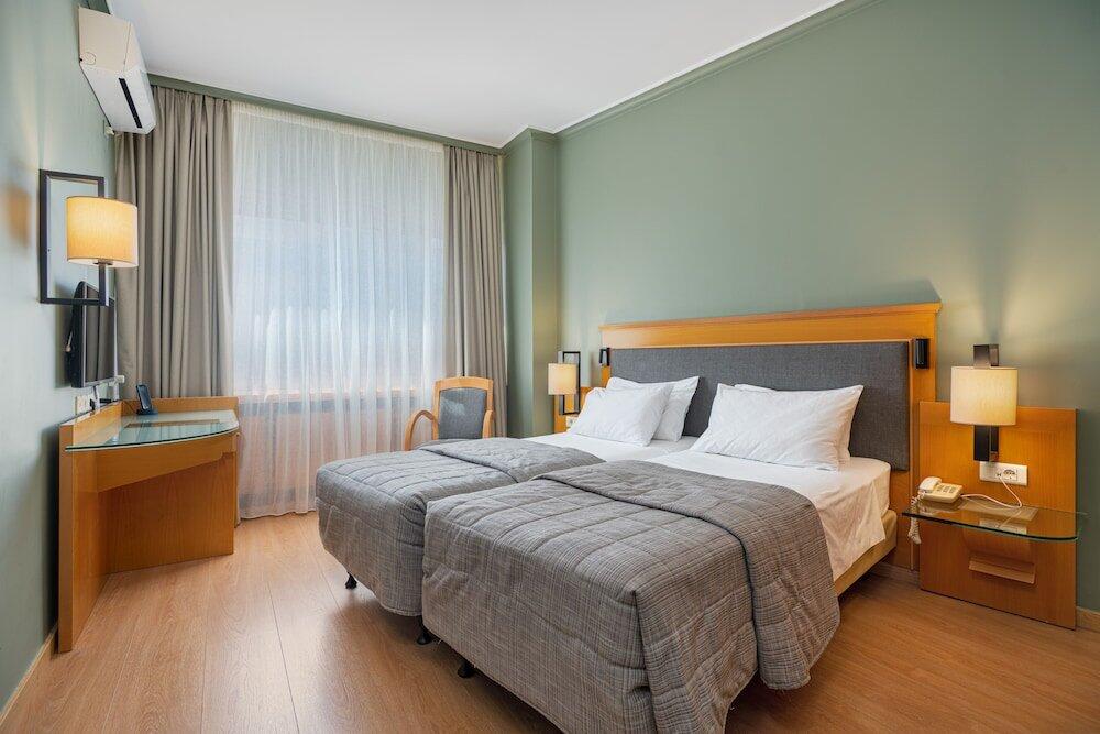 Foto de una habitación de Plaka Hotel