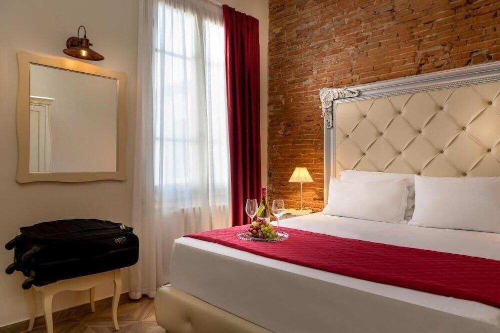 Foto de una habitación de Hostal Residenza Conte di Cavour &amp;amp; Rooftop