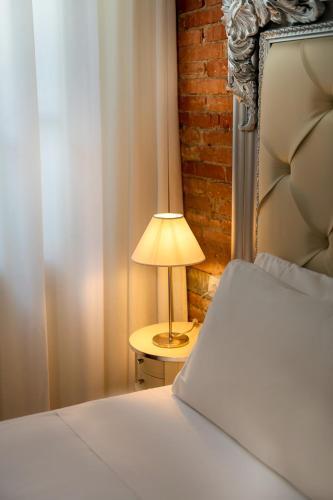 Foto de una habitación de Hostal Residenza Conte di Cavour &amp;amp; Rooftop