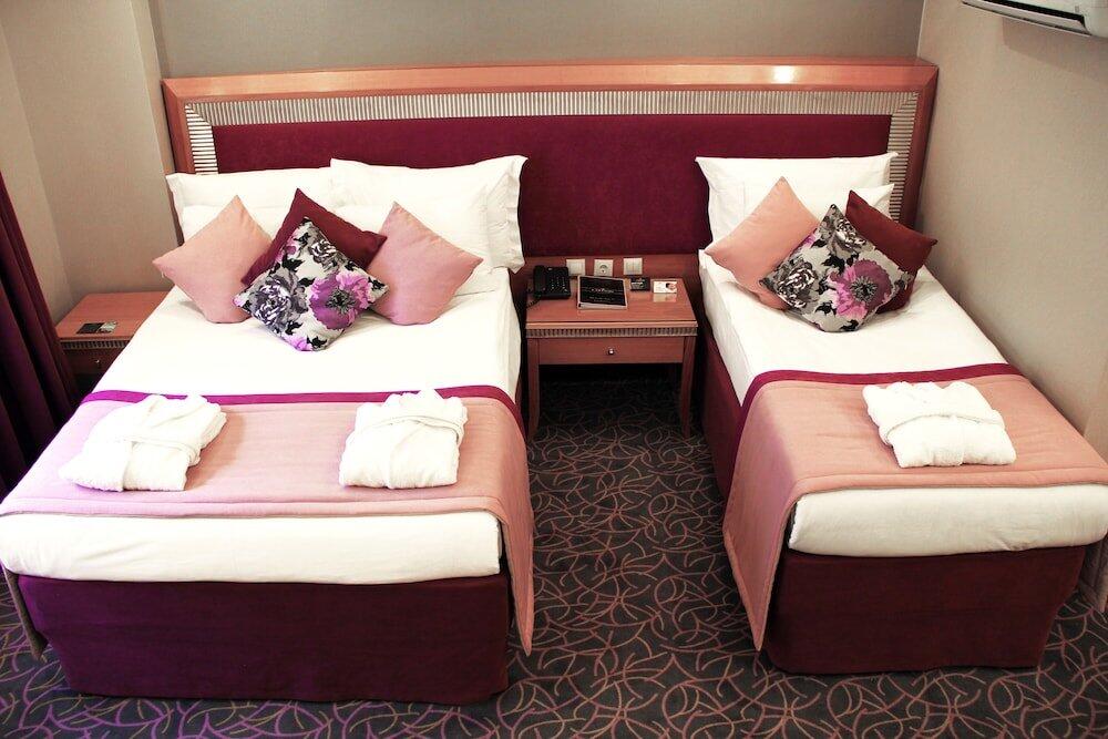Foto de una habitación de Carlton Hotel Old City