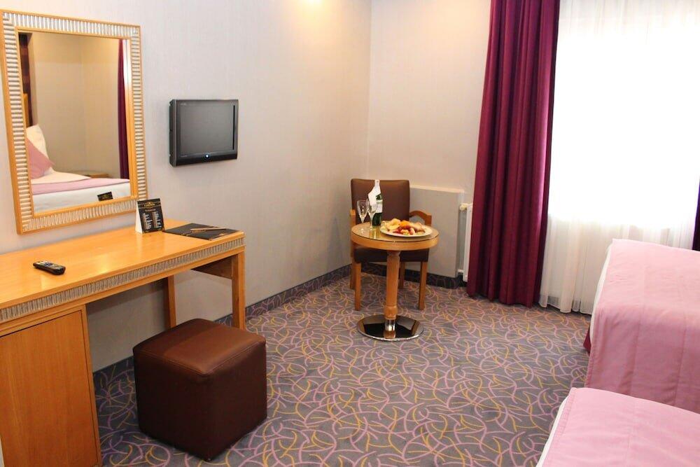 Foto de una habitación de Carlton Hotel Old City