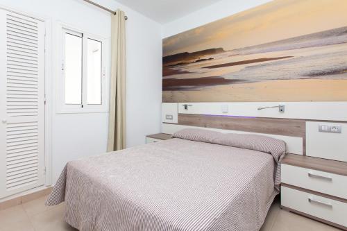 Foto de una habitación de Apartamentos TAO Caleta Playa