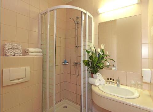Foto del baño de City Hotel Pilvax