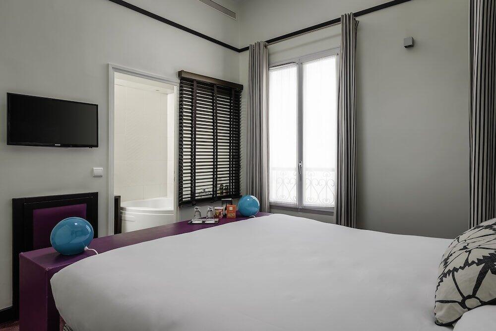 Foto de una habitación de Hotel Courcelles Etoile