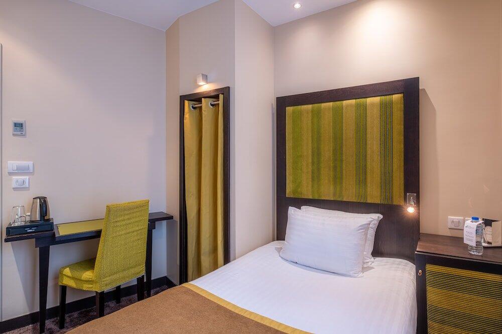 Foto de una habitación de Hotel Courcelles Etoile