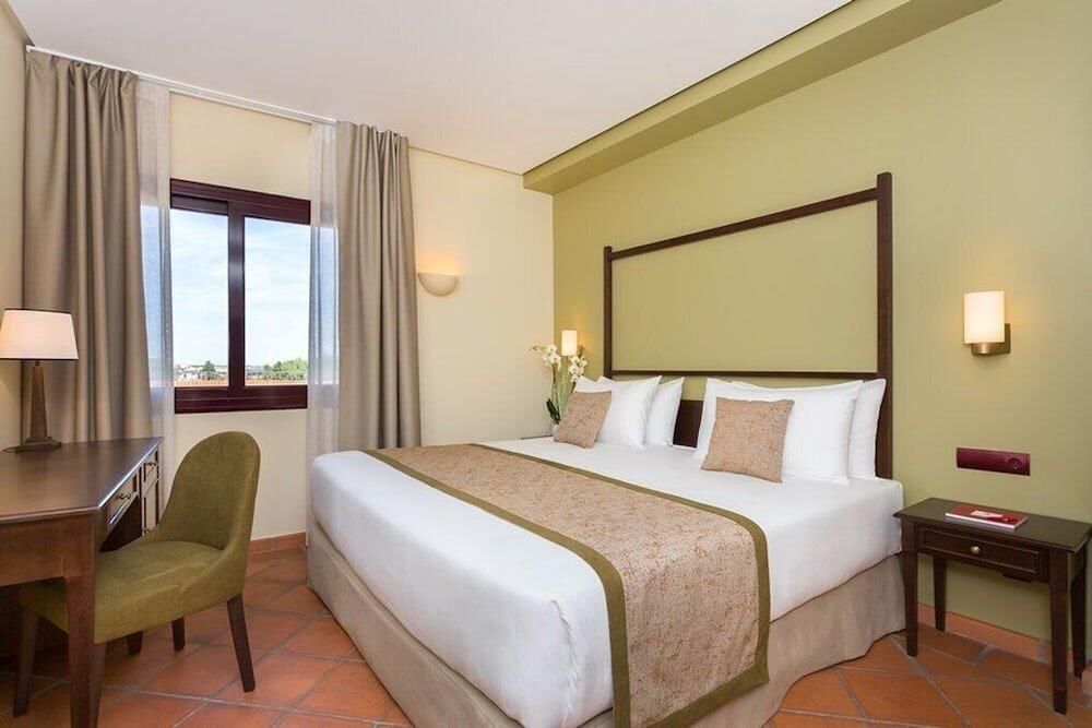 Foto de una habitación de Hotel Exe Layos Golf