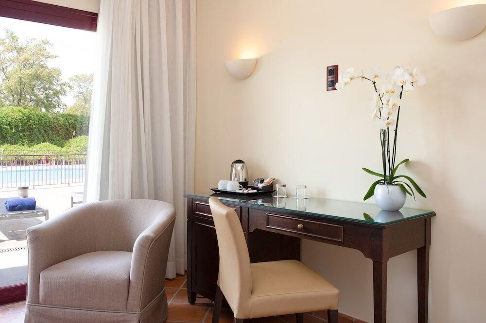 Foto de una habitación de Hotel Exe Layos Golf