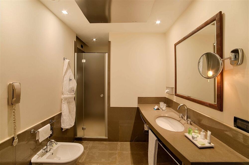 Foto del baño de Hotel NH Bergamo