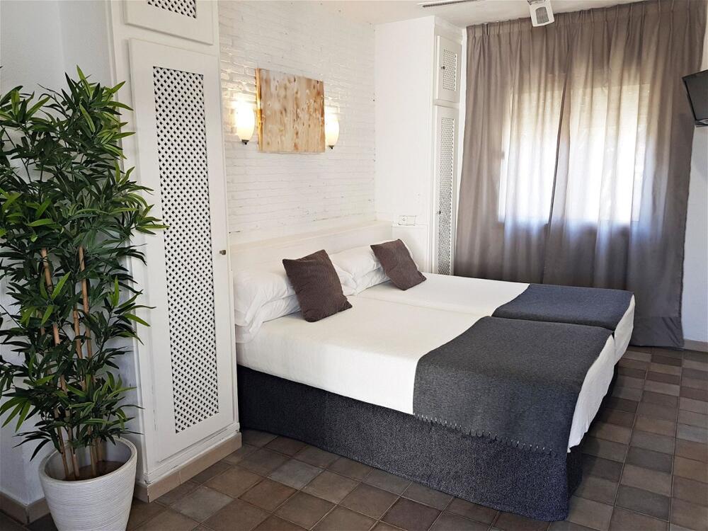 Foto de una habitación de Hotel Campomar Playa