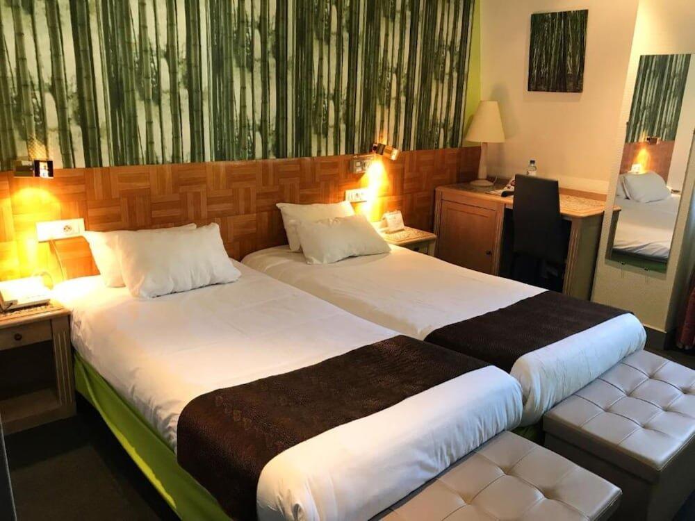 Foto de una habitación de Brit Hotel Aux Sacres Reims Centre
