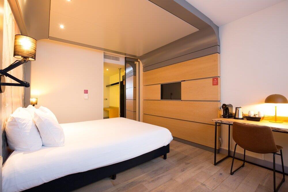 Foto de una habitación de Leonardo Hotel Almere City Center