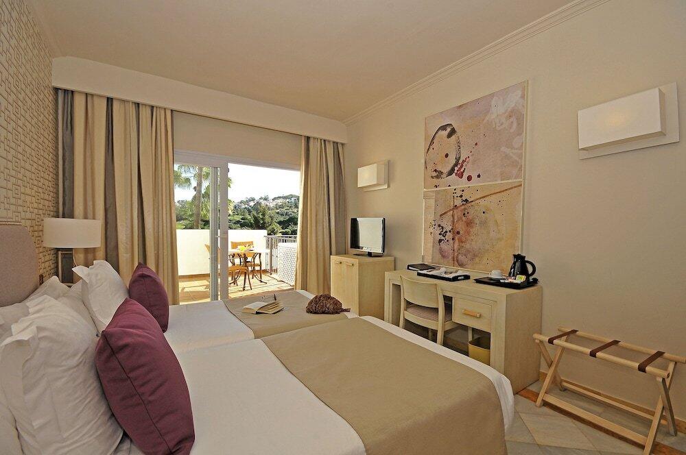 Foto de una habitación de Hotel La Cala Resort