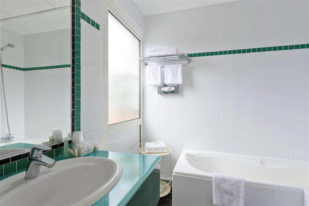 Foto del baño de Hotel Best Western Astoria