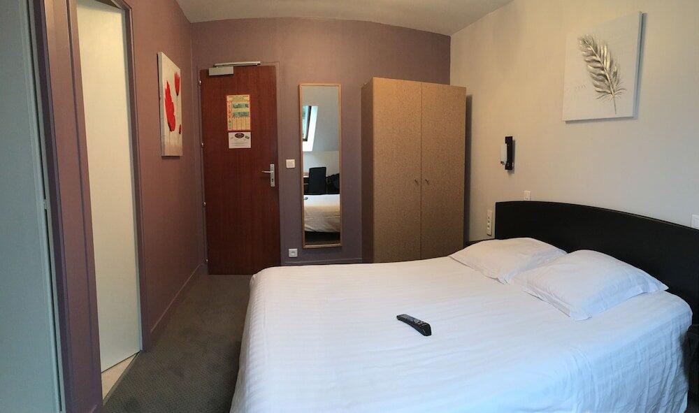 Foto de una habitación de Hotel Le Bayeux