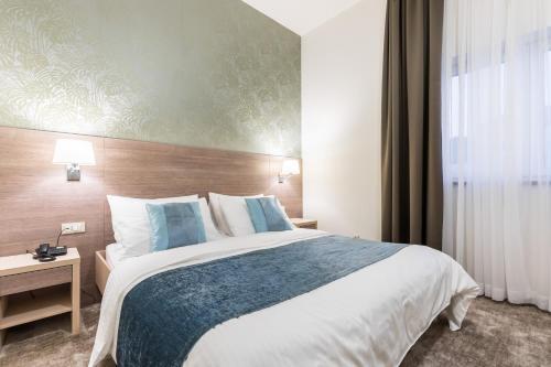 Foto del baño de Hotel Mondo