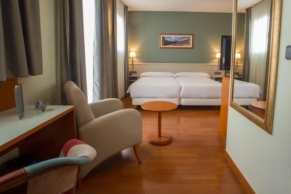 Foto de una habitación de Hotel Checkin Alaquas