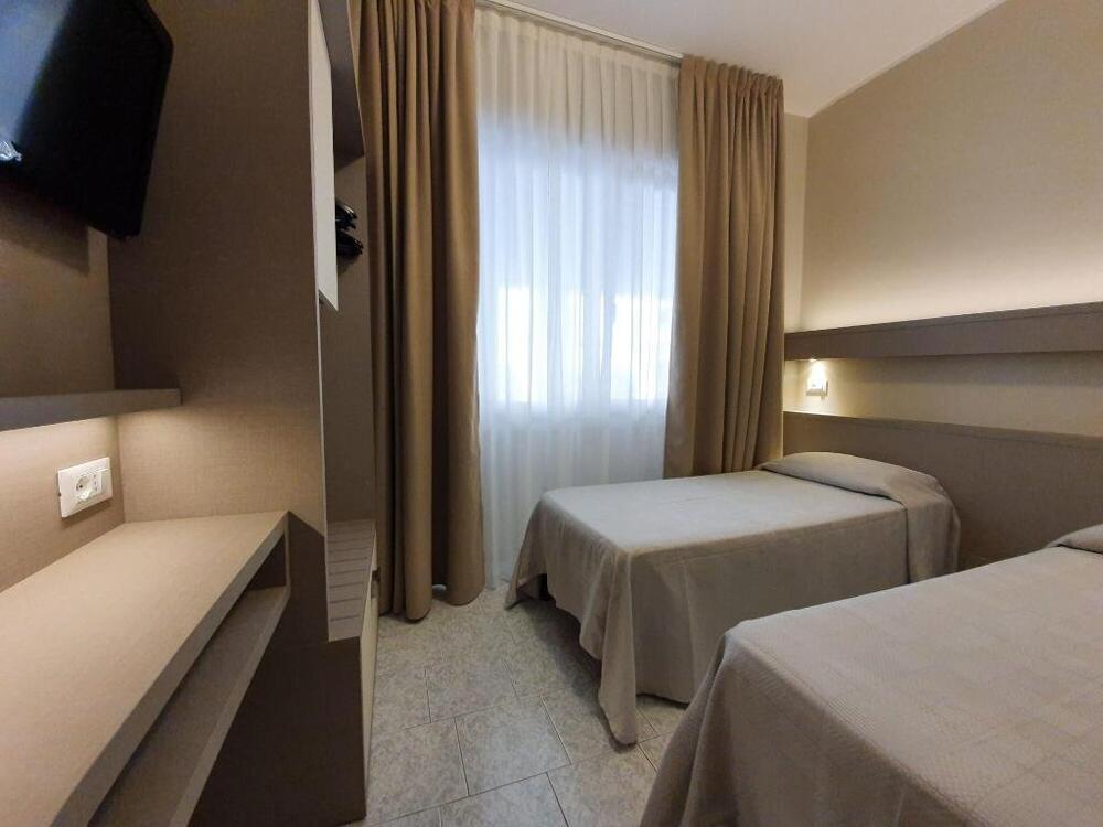 Foto de una habitación de Hotel Corallo