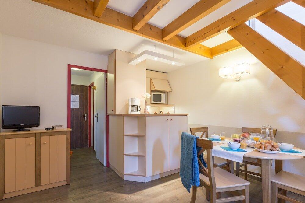 Foto de una habitación de Résidence Pierre &amp;amp; Vacances Les Ravines