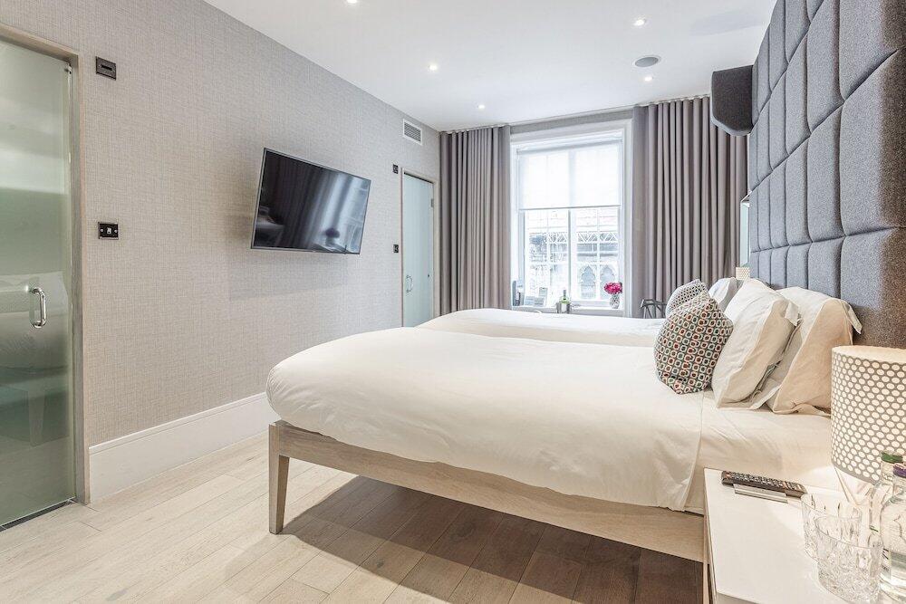 Foto de una habitación de Hotel The Inn on the Mile