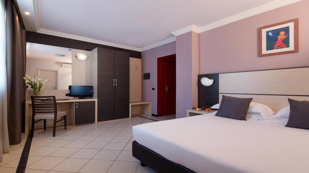 Foto de una habitación de CDH Hotel La Spezia
