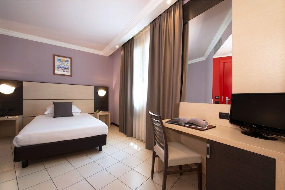 Foto de una habitación de CDH Hotel La Spezia
