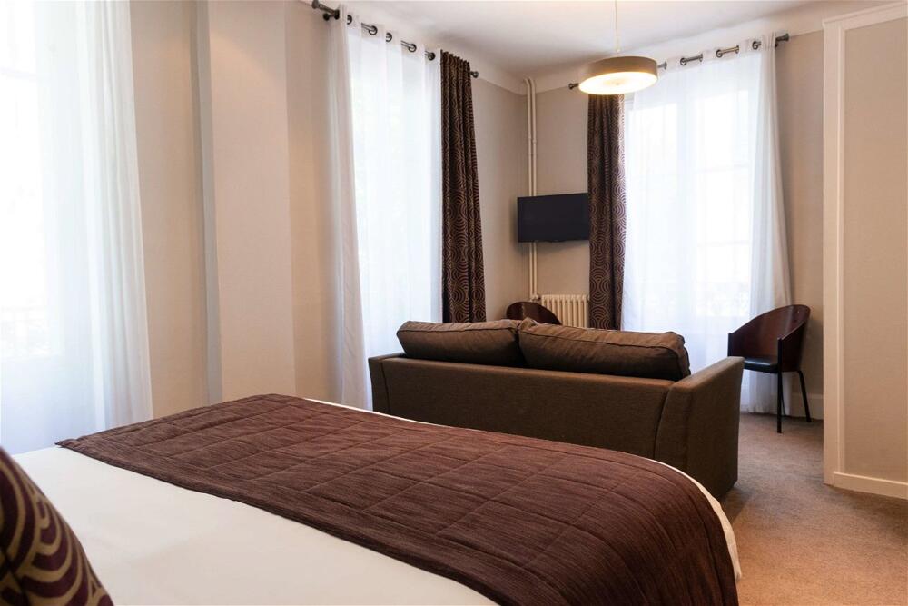 Foto de una habitación de The Originals Boutique, Hôtel Les Nations, Vichy